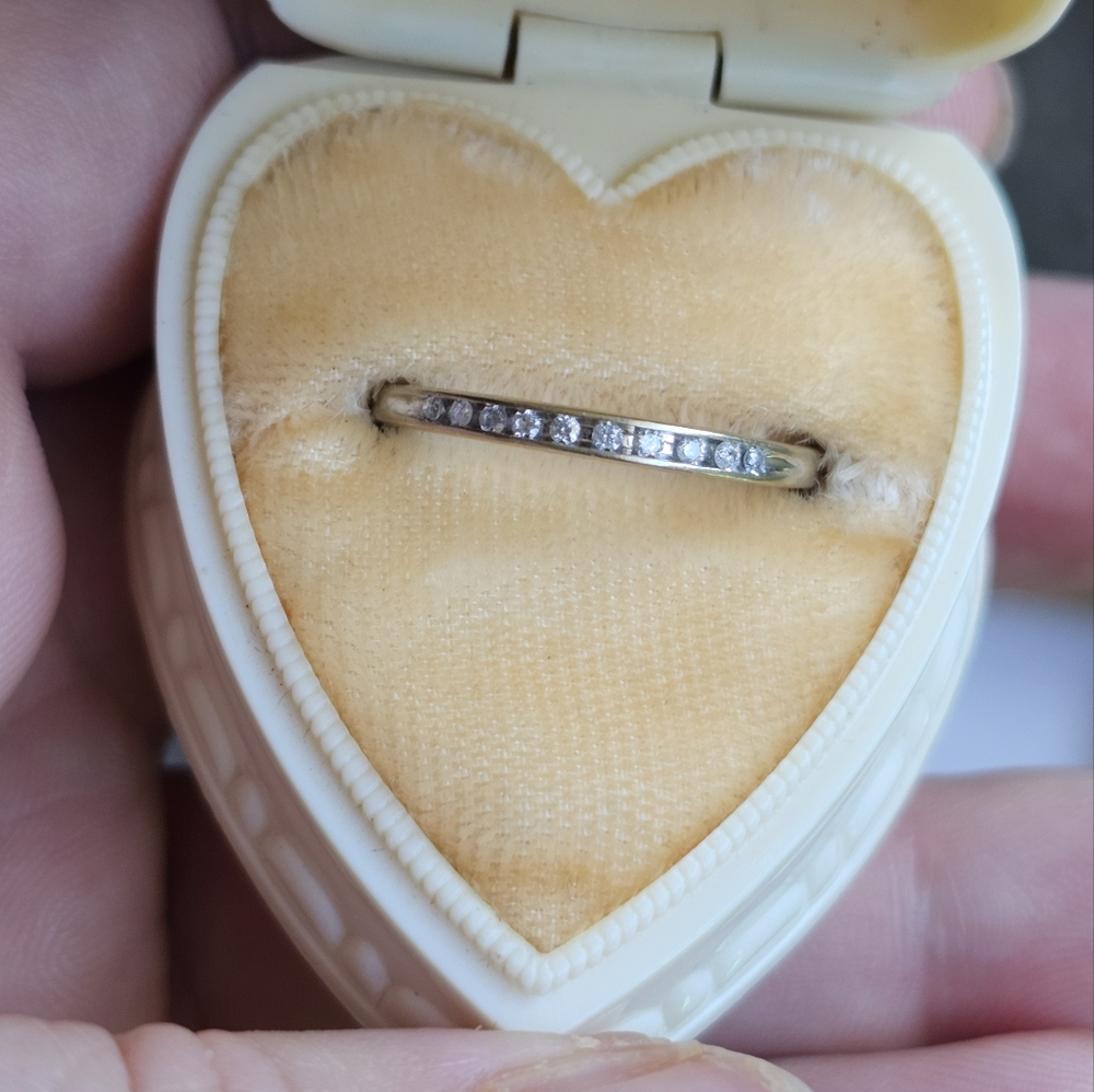 10k gold diamond band 6 3/4. Stamped 10k. White gold but has some fading. Could